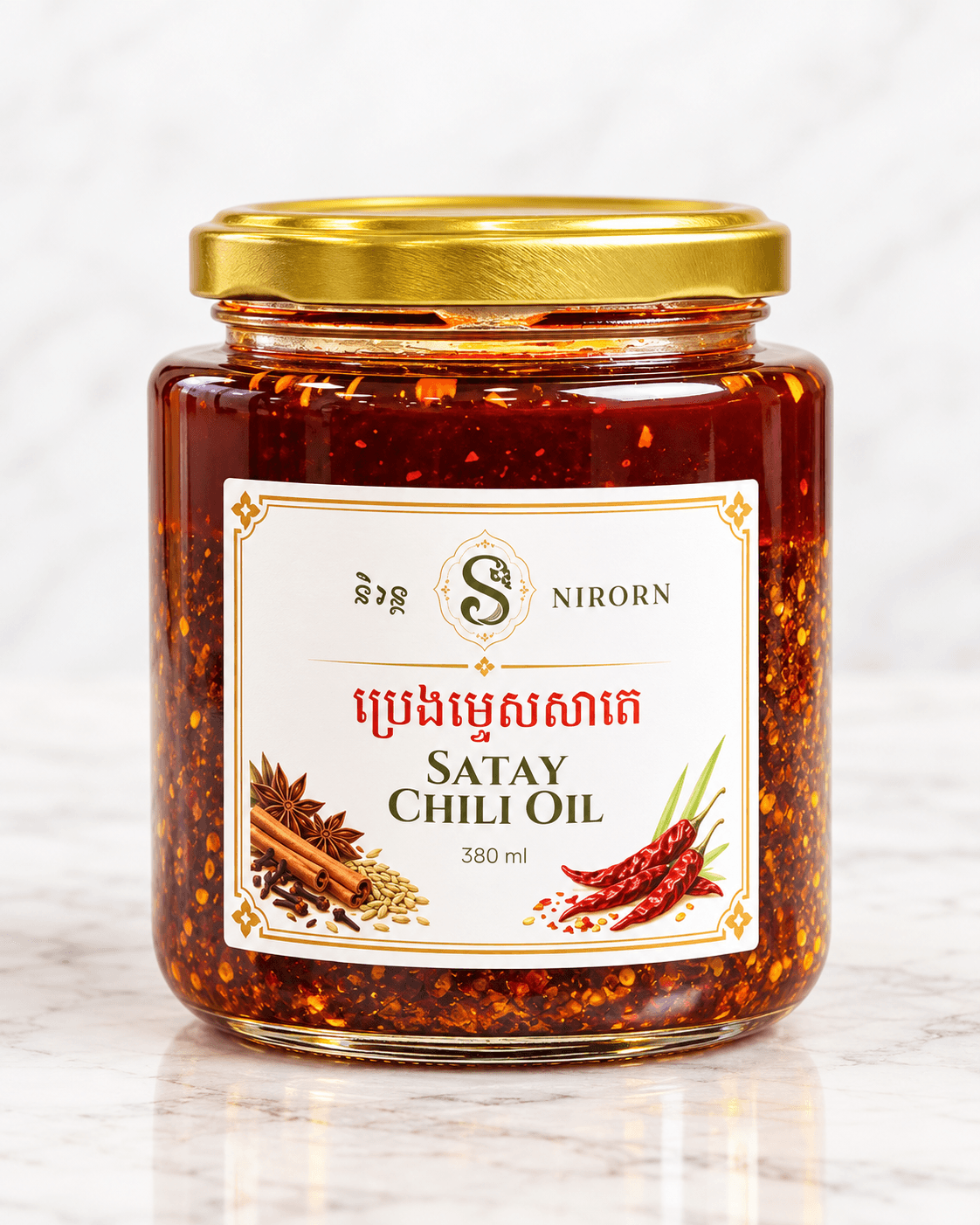 A 380 ml jar of Nirorn Satay Chili Oil on white marble